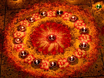 a circular arrangement of candles on a floor